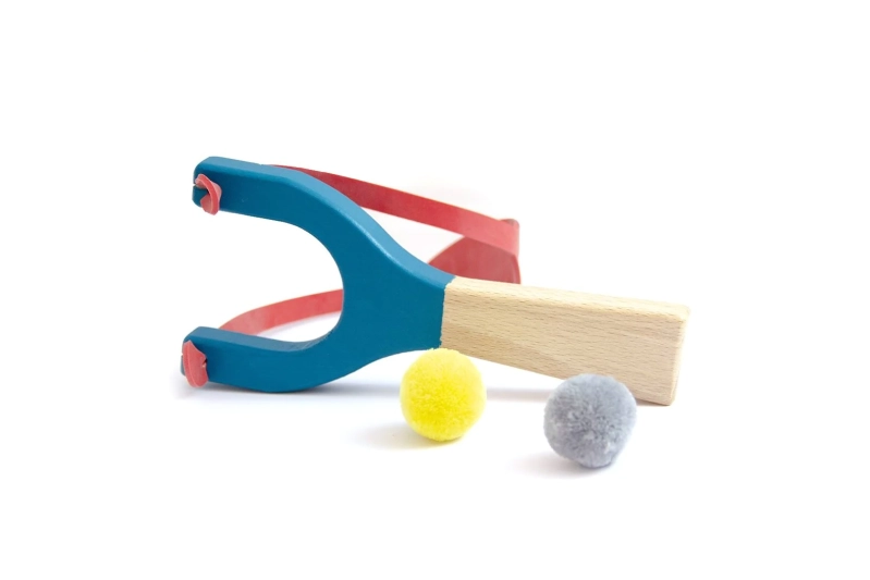 Tiraxines Llança pompons de fusta