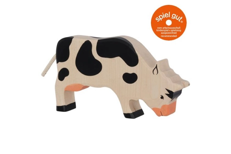 Vaca pastando Holztiger