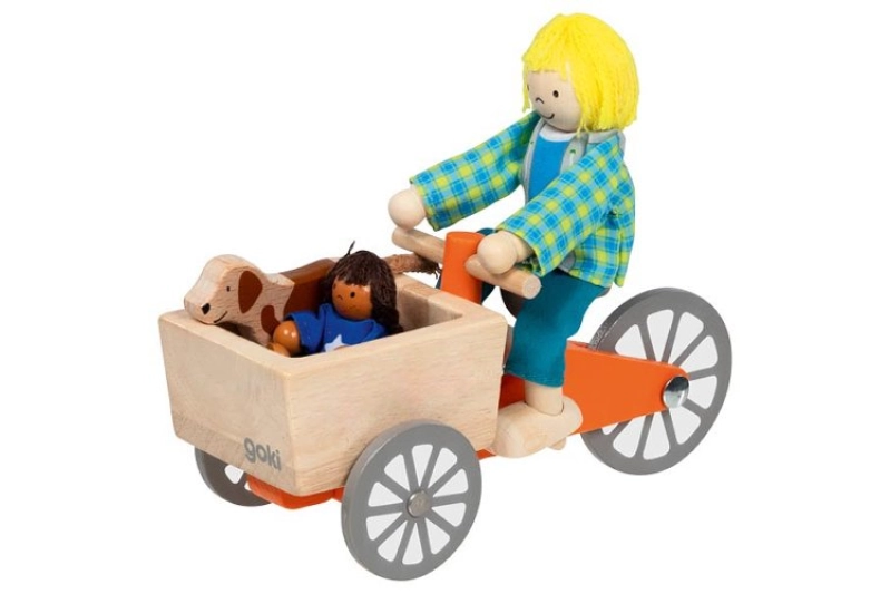 Bicicleta con dos muñecos articulados y perro