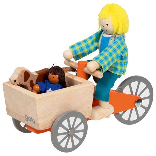 Bicicleta con dos muñecos articulados y perro