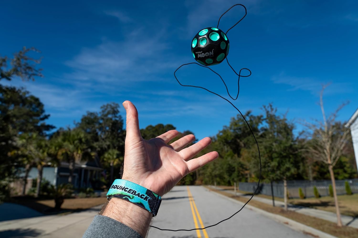 Waboba Pelota Bounceback con cuerda elástica